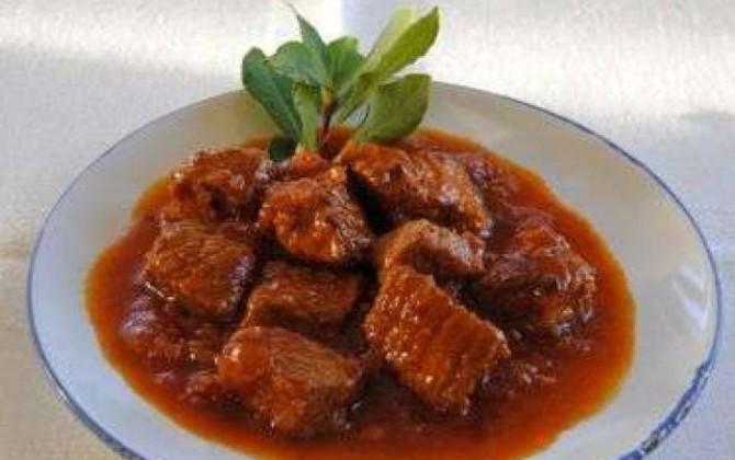 ternera con tomate