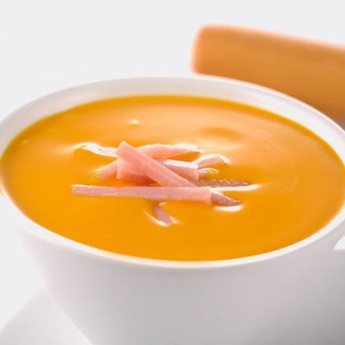 Crema de calabaza con puerros y juliana de jamón de york