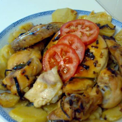 pollo entero troceado al horno con patatas | Recetas Gallina Blanca