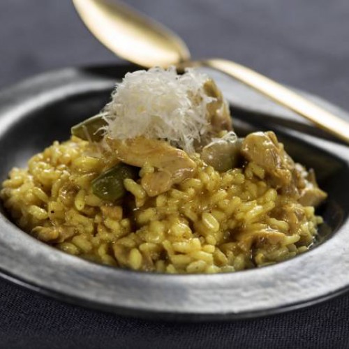Risotto al curry con guisantes bajo en sal